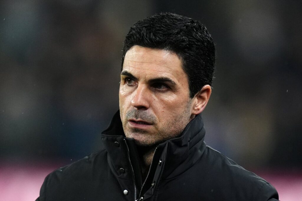 Mikel Arteta gesturing passionately from the touchline during an Arsenal match