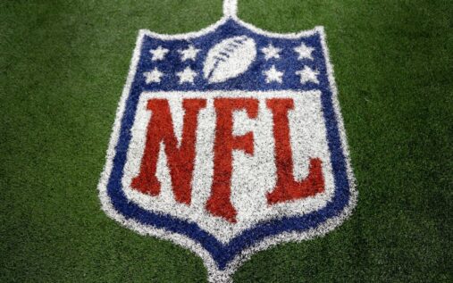 Close up of an official NFL american football on the turf during a game