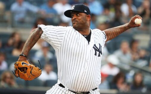 CC Sabathia pitching for the New York Yankees during his tenure at Yankee Stadium