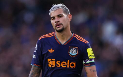Bruno Guimaraes looking dejected while clapping the fans in a Newcastle United shirt