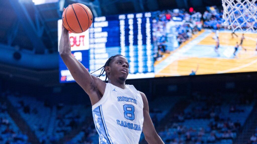 Caleb Wilson of the North Carolina Tar Heels dribbling the basketball during an NCAA game