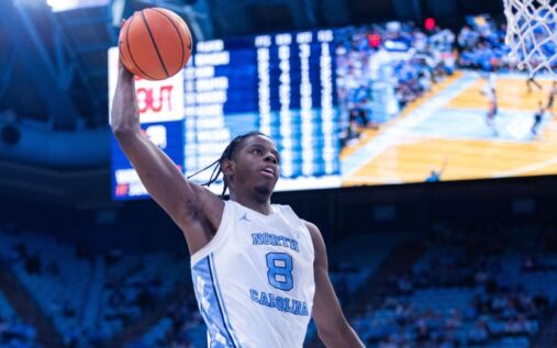 Caleb Wilson of the North Carolina Tar Heels dribbling the basketball during an NCAA game