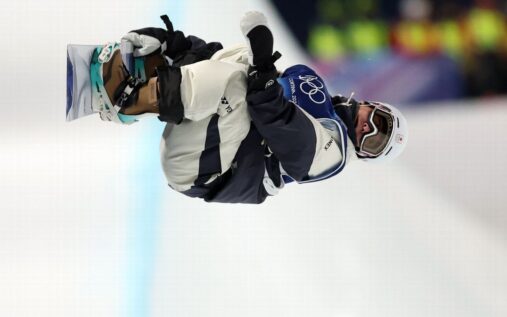 Yuto Totsuka performing a high-flying trick in the halfpipe during the Olympic final