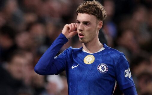 Chelsea forward Cole Palmer looking tired with hands on hips during a Premier League match