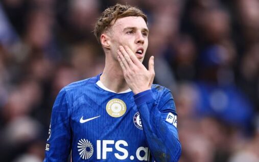 Chelsea forward Cole Palmer looking tired with hands on hips during a Premier League match