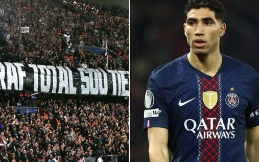 PSG fans holding a banner at the Parc des Princes reading 'Achraf, Total Support'