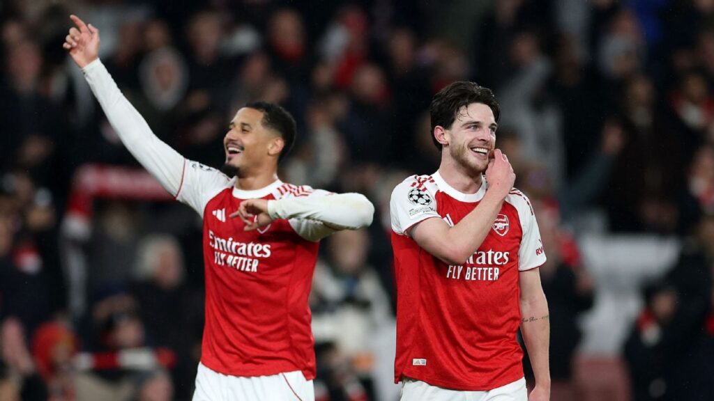 Arsenal players celebrating a goal during a Champions League match