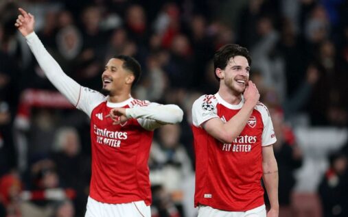 Arsenal players celebrating a goal during a Champions League match