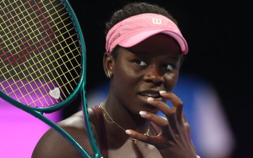 Karolina Muchova celebrating with the Qatar Open trophy after defeating Victoria Mboko in the final