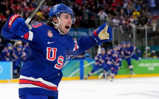 Quinn Hughes celebrating his overtime winning goal for Team USA against Sweden