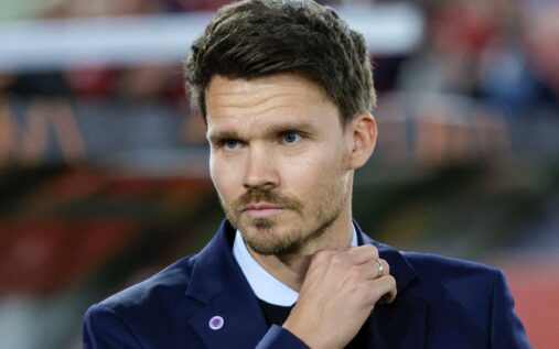 Mikey Moore applauding fans during a match for Rangers