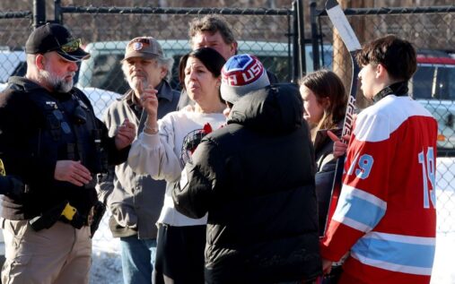 Police vehicles and emergency tape outside the Dennis M. Lynch Arena in Pawtucket, Rhode Island