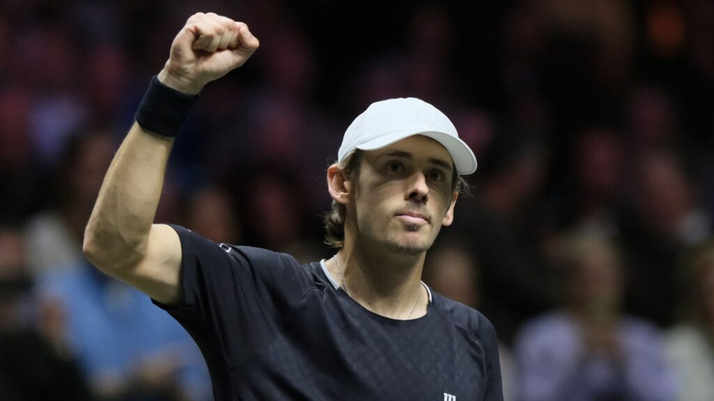 Alex de Minaur celebrating with the trophy after winning the Rotterdam Open final