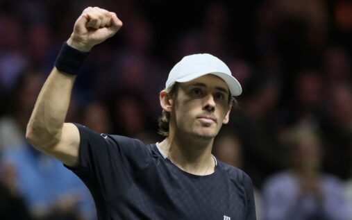 Alex de Minaur celebrating with the trophy after winning the Rotterdam Open final