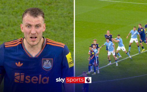 Ruben Dias jostling with Dan Burn in the penalty area during Manchester City vs Newcastle United