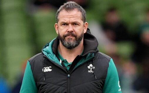 Ireland head coach Andy Farrell watching a rugby match from the sidelines