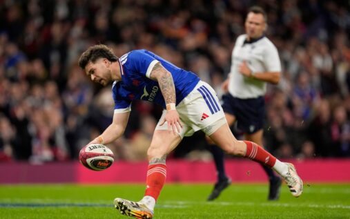 Matthieu Jalibert passing the ball during a training session for the France rugby team