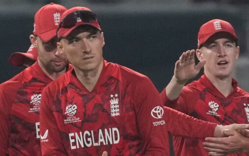 Harry Brook and Will Jacks discussing tactics on the field during the T20 World Cup match against Italy