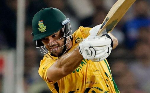 Aiden Markram raising his bat to the crowd after scoring a half-century for South Africa against New Zealand