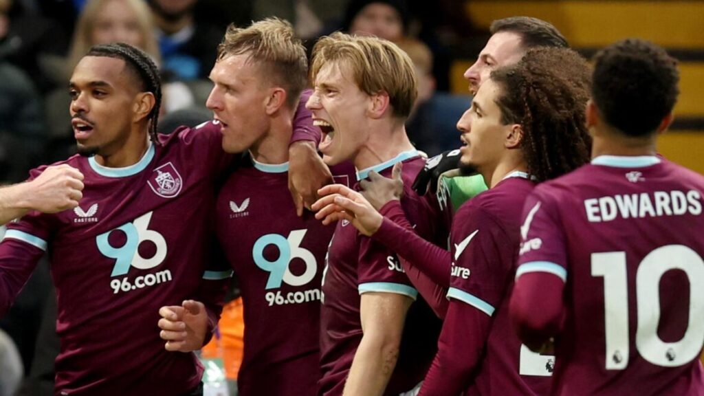 Burnley forward Zian Flemming celebrating his late equaliser against Chelsea at Stamford Bridge