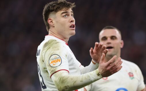 Tommy Freeman running with the ball during an England Six Nations match