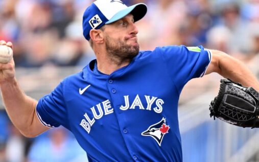 Max Scherzer pitching for the Toronto Blue Jays during a game