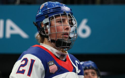 USA captain Hilary Knight skating with the puck during a women's ice hockey match against Canada
