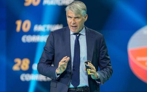 UEFA referees' chief Roberto Rosetti gesturing while speaking at a press conference