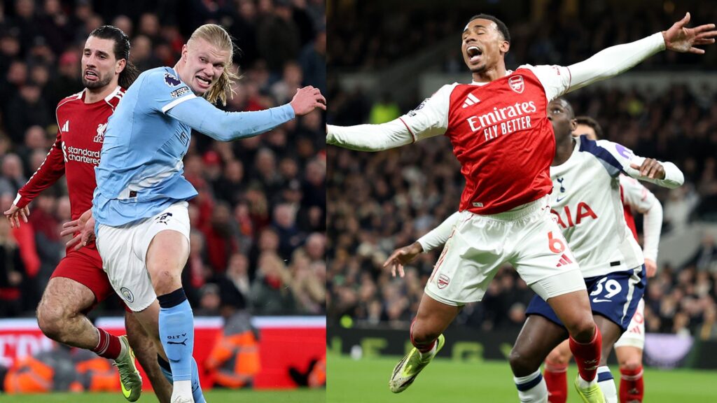 Referee Craig Pawson communicating with VAR during a Premier League match