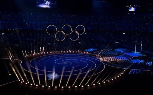 The historic Verona Arena Roman amphitheatre lit up at night ready to host the Winter Olympics closing ceremony