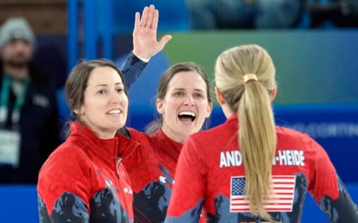 The US women's curling team celebrating on the ice after defeating Canada at the Winter Olympics