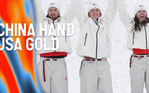 Chris Lillis of the USA celebrates after a jump during the mixed team aerials final at the Winter Olympics