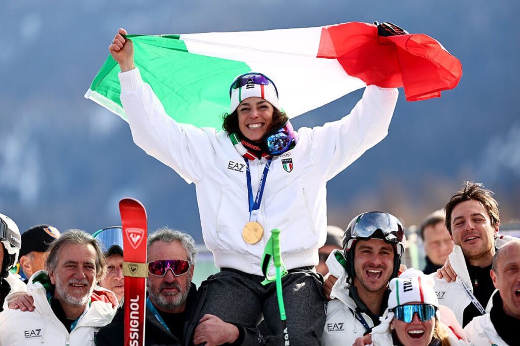 An athlete competing on the snowy slopes of the Milan-Cortina 2026 Winter Olympics