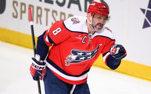 Washington Capitals forward Alex Ovechkin celebrating on the ice after scoring a goal