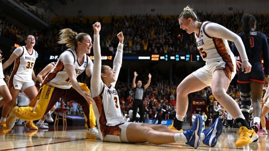 Amaya Battle of the Minnesota Gophers celebrates hitting the game-winning shot against Ole Miss in the NCAA tournament