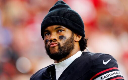 Arizona Cardinals quarterback Kyler Murray looking on from the sideline during an NFL game