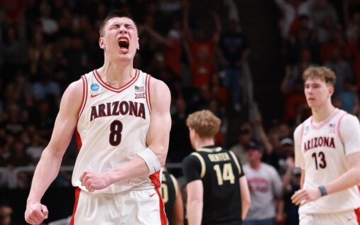 Arizona Wildcats basketball players celebrating their victory over Purdue on the court