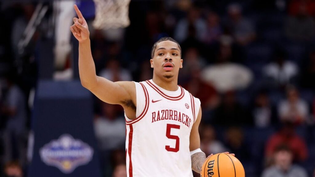 Darius Acuff Jr playing for the Arkansas Razorbacks during an NCAA college basketball game