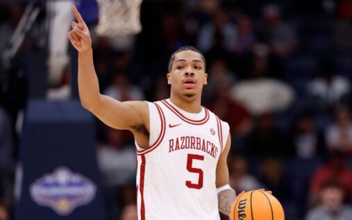 Darius Acuff Jr playing for the Arkansas Razorbacks during an NCAA college basketball game