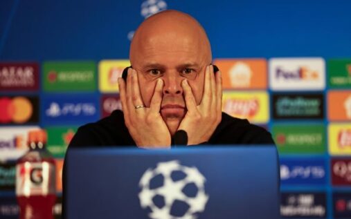 Arne Slot looking concerned on the touchline during a Liverpool match