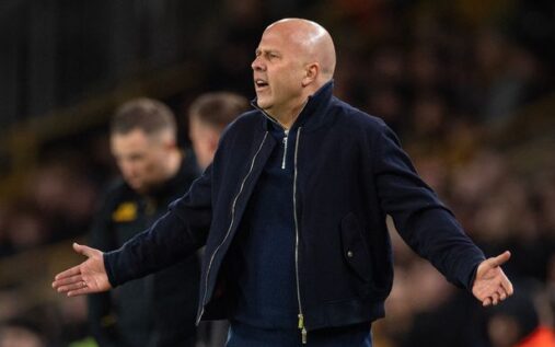 Liverpool manager Arne Slot looking concerned on the touchline during a match