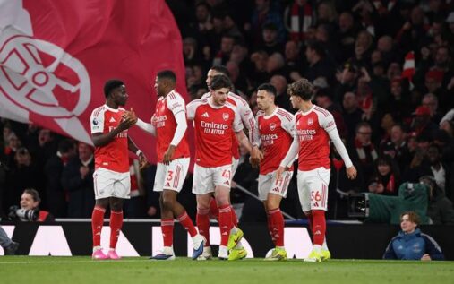 Arsenal manager Mikel Arteta celebrating a crucial Premier League victory on the touchline