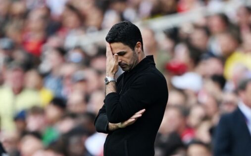 Noni Madueke receiving medical treatment on the pitch during an England match at Wembley