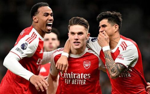 Arsenal players celebrating a goal from a set-piece corner kick