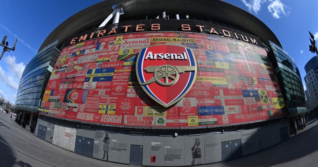 The Arsenal club crest displayed proudly on the exterior of the Emirates Stadium