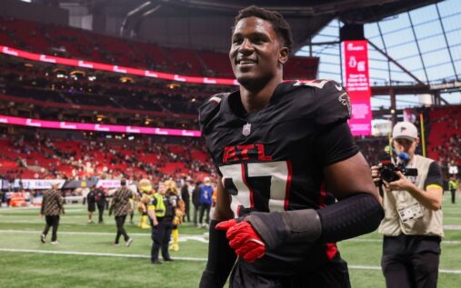James Pearce Jr of the Atlanta Falcons walking on the field in uniform