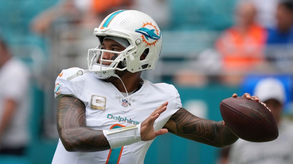 Tua Tagovailoa preparing to throw a pass during an NFL game