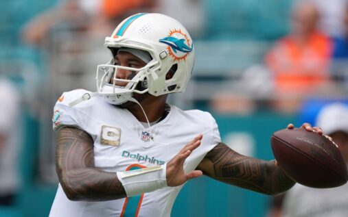 Tua Tagovailoa preparing to throw a pass during an NFL game