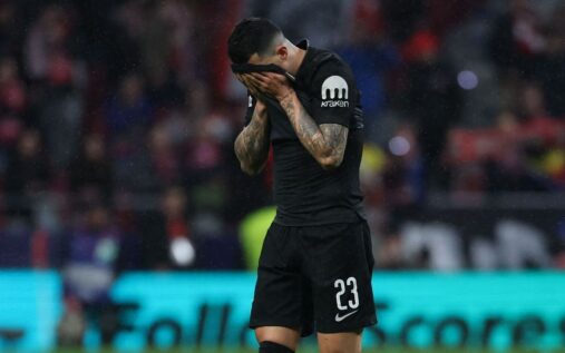Dejected Tottenham Hotspur players react during their heavy Champions League defeat to Atletico Madrid
