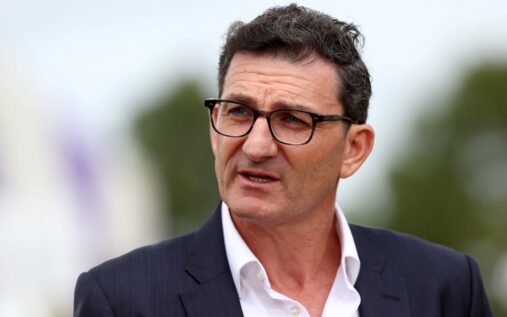 Formula 1 cars racing around the Albert Park circuit in Melbourne during a practice session